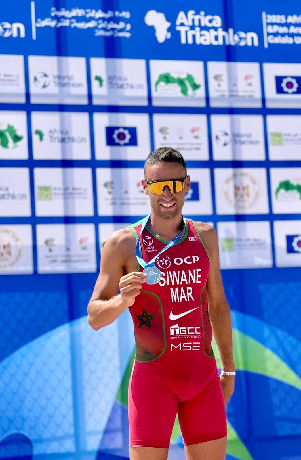 بدر السيواني يتألق في بطولتي إفريقيا والعرب في الترايثلون